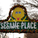 Big Bird is shown on a sign near an entrance to Sesame Place in Langhorne, Pa., Dec. 26, 2019. Sesame Place announced on Tuesday, Aug. 9, 2022, the implementation of diversity and inclusion training for its employees following a $25 million class-action lawsuit alleging multiple incidents of discrimination after outcry sparked from a video of a costumed character snubbing two 6-year-old Black girls went viral online.